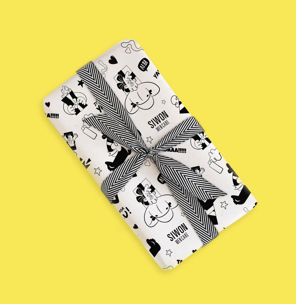 Cadeau emballé dans le papier illustré Siwon